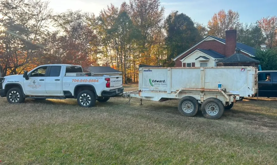 Covenant Tree Care truck towing a debris trailer